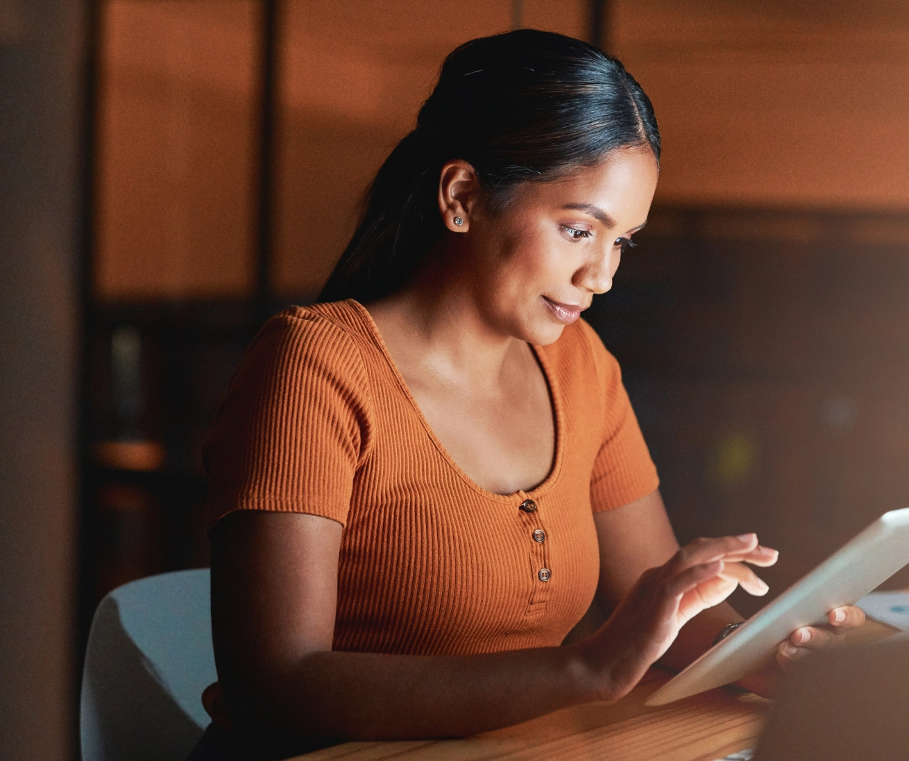 A Lady Veiwing Content On Her Device